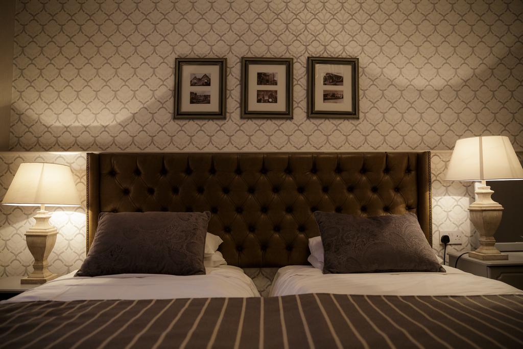 Dooly'S Hotel Birr Bagian luar foto